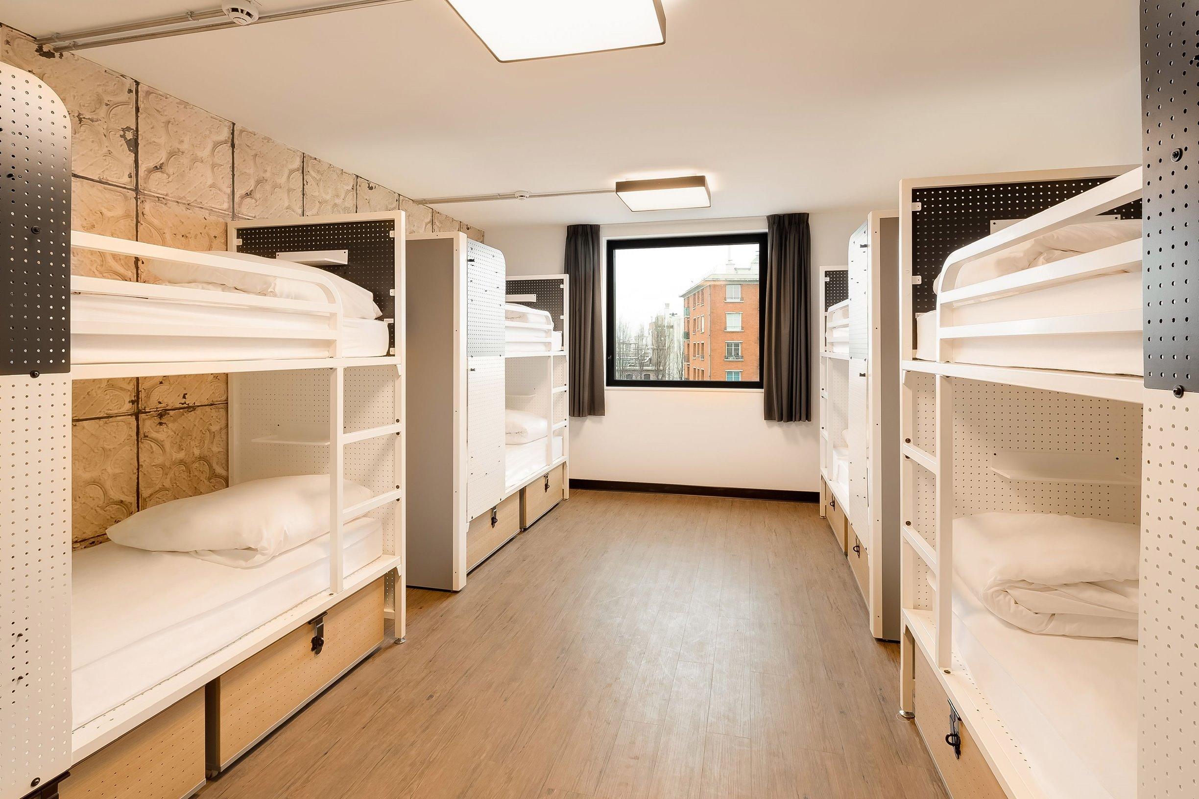 Bed in 8-bed Dorm – Shared Bathrooms